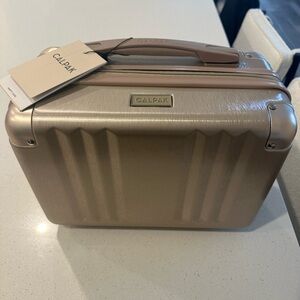 Calpak rose gold vanity case
